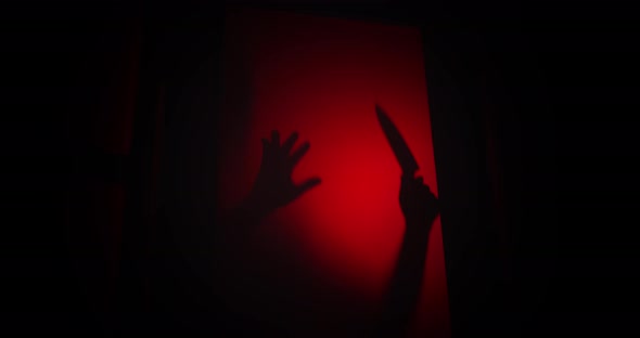 Psycho killer shadow draws a knife