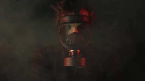 Apocalypse or armageddon concept. Man in gas mask