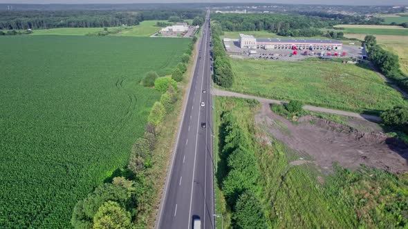 Semitrucks with Freight Trailers Standing at the Ramps alt