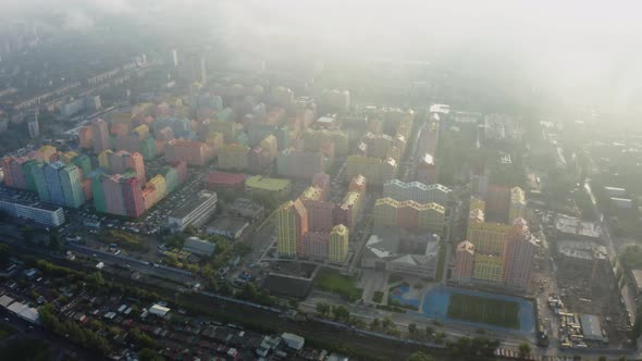 Top view of the colorful modern buildings, aerial footage from the drone alt