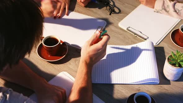 Executives discussing with each other during a meeting 4k alt