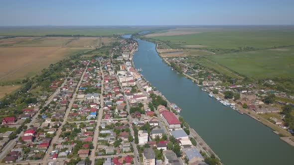Aerial View Of Sulina City Harbor And The Danube Flowing Into The Black Sea alt