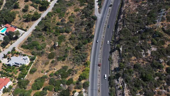Aerial shot above the main highway into the city of Nicosia, van life, road trip alt