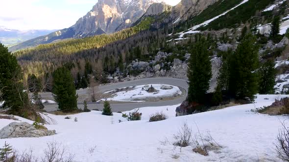 Sunrise from mountains road in Passo Falzarego in spring, Dolomites, Italy alt