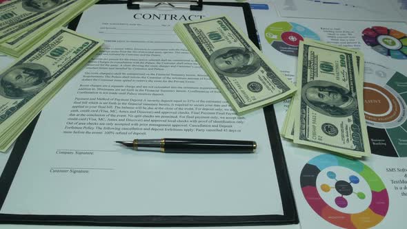 Financial Business Contract And Money On The Table In The Office Of The Company alt