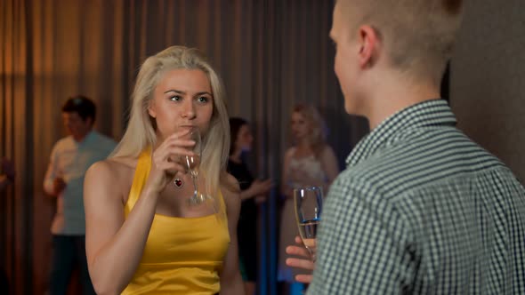 Sexy Lady Flirt with Young Man at Private Party alt