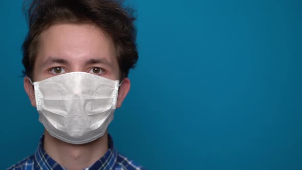 Boy Feeling Sick and Wearing Mask alt