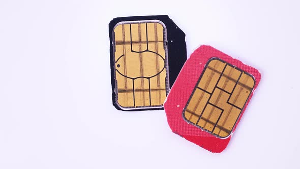 Used SIM Cards of Mobile Operators Rotate Closeup