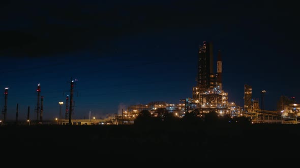 Night View of the Oil Refinery Plant alt