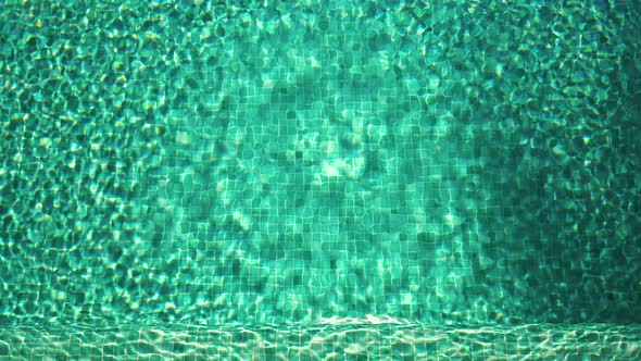 A Game of Glare on the Water in the Pool