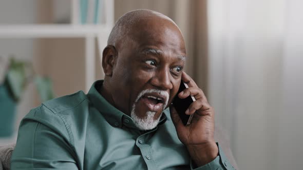 African American Adult Older Man Answering Phone Call Receive Good News Happy Elderly Grandpa Winner alt