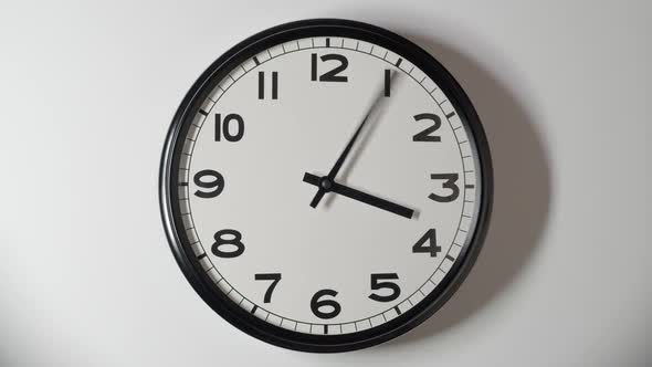 White Clock Face 3.1 FHD Close Up in Time Lapse on White Wall in Office