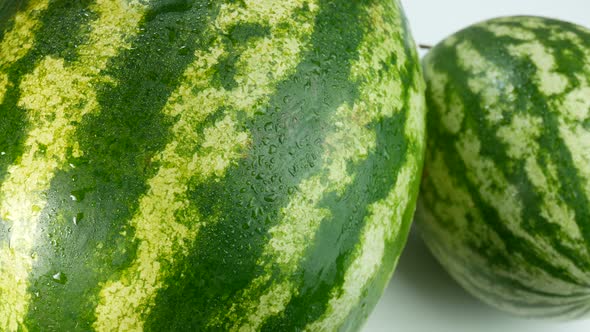 Two Watermelons  Covered In Drops Of Water