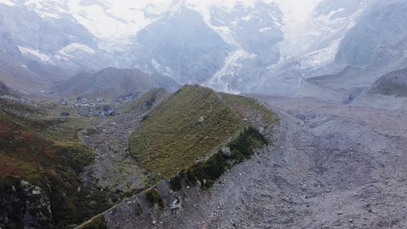 Aerial View of Belvedere Glacier Rock Wall Discovered By Ice Melting alt