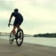 Cyclist Riding On Road Bike In Park And Getting Ready For Triathlon. Sport Concept. Fit Athlete. - VideoHive Item for Sale