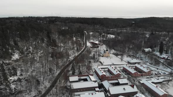 Jonsered Church and Traditional Community At Winter Outside Gothenburg Aerial alt