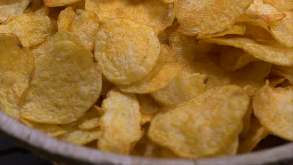 Potato Chips Rotating On Plate