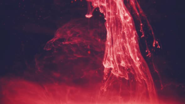 Abstract Red Ink Flowing in Water alt