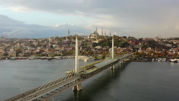Aerial drone of a cloudy sunrise morning in Istanbul Turkey overlooking the the Hagia Sophia atop a alt