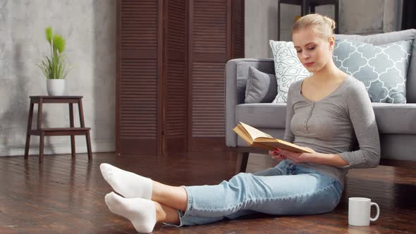 Young woman is resting at home alt