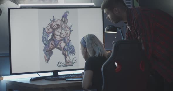 Game Developers Discussing Game Art alt