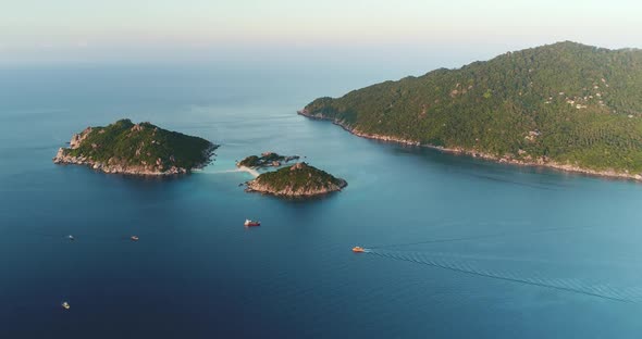 Pacific Ocean Aerial Thailand's Yachts Ships Boats on Blue Water of Tanote Bay Koh Tao Islands
