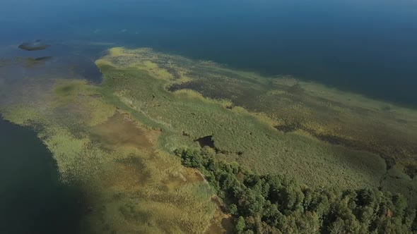 Aerial Drone Video Over a Natural Shallow in the Middle of the Lake