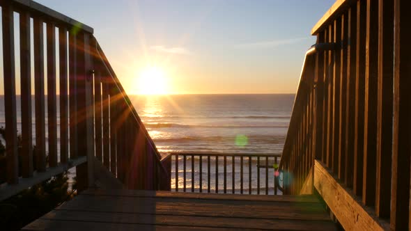 Sunset at walkway to beach alt