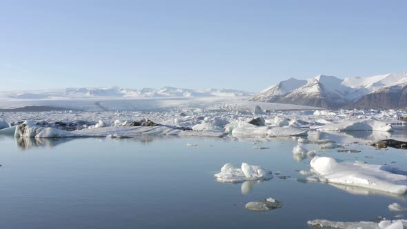 Glacier Lagoon in Iceland Filled With Icebergs Low Flight alt