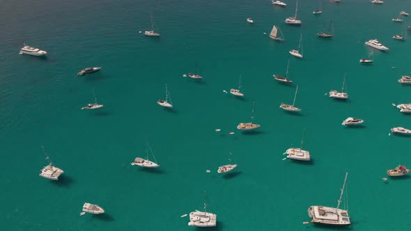 Aerial View of Many Yachts in a Bay on Formentera Island alt