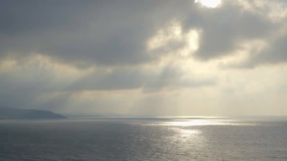 Beautiful Sunset at Sea with Cloudy Sky