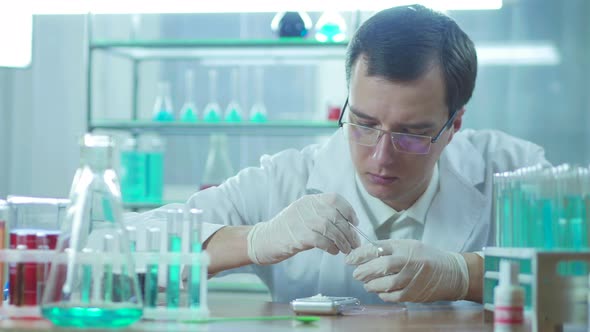 Doctor Work In Laboratory With Electronic Balance alt