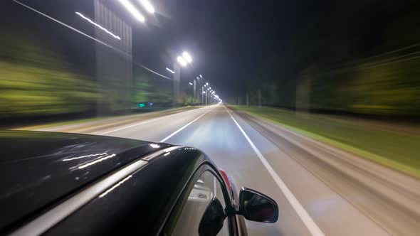 Drivelapse From Top Side of Car Moving on a Night Highway Timelapse Hyperlapse alt