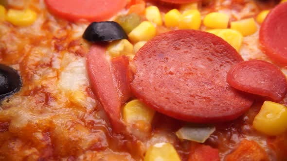 Close up of Appetizing Pizza  on turntable.