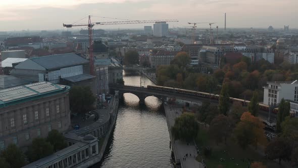 S Bahn Train Crossing Spree River on Railway Bridge Heading to Museum Island alt