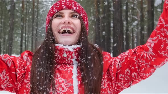 Girl Playing with Snow in Park alt