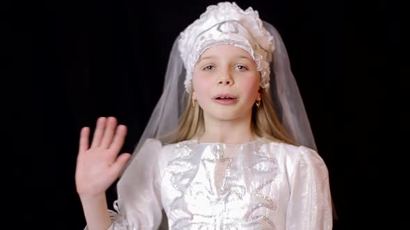 Small Girl Sitting on Couch Alone at Home alt