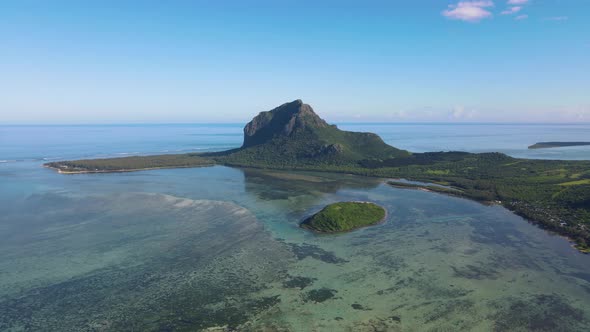 Le Morne Beach MauritiusTropical Beach with Palm Trees and White Sand Blue Ocean and Beach Beds with alt