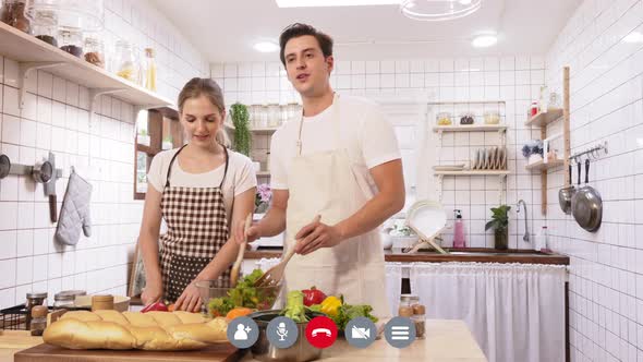 Monitor screen of happy Caucasian couple showing how to cook salad
