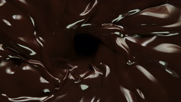 Super Slow Motion Shot of Chocolate Vortex at 1000 Fps. alt