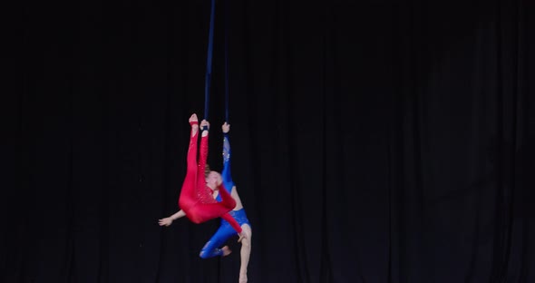 Beautiful Show on Stage Two Girls are Spinning on Strings Aerial Gymnastics alt
