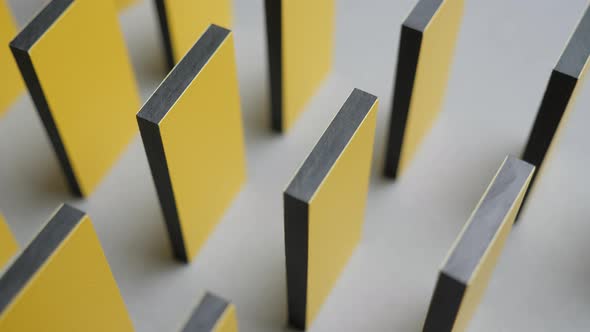 Yellow Domino. Falling Yellow Color Dominos. Causality Background. Domino Effect. Yellow Dominos