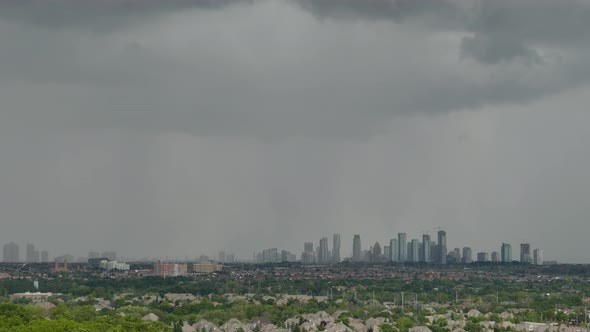 Massive grey rain clouds over Mississauga, Canada in time lapse view alt