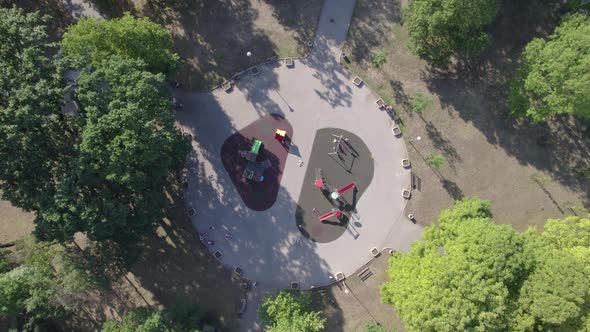 Drone Top View of Happy Families Playing in Public Park Playground in Sunny Weekend Day alt