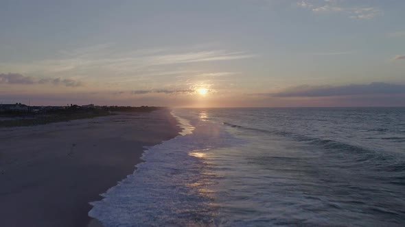 Waves Crashing at the Westhampton Beach Shore During Sunset alt