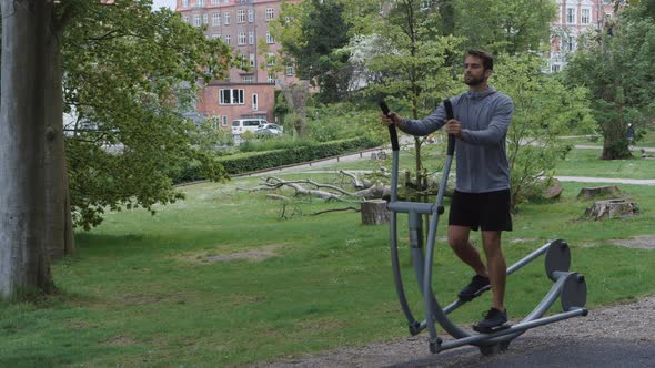 Athlete Using Forest Cross Trainer