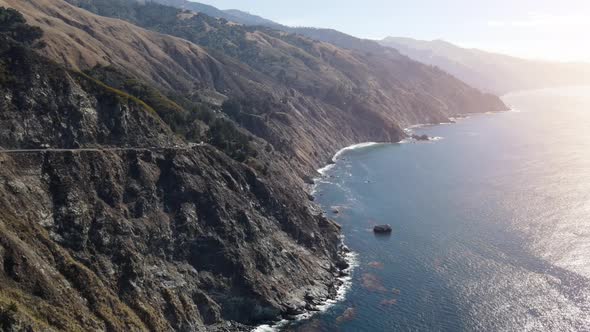 Aerial of the rugged coastline in California alt