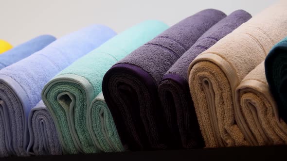 Different Color Towels on the Counter of the Store