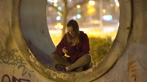 Teenager On The Street With Smartphone