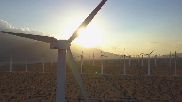 Wind Turbine Close Up Sunset Aerial Tracking Shot Sustainable Alternative Energy